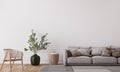Mockup wall in farmhouse living room interior, beige sofa on white wall background Royalty Free Stock Photo