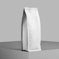 Mockup of a white bag for coffee beans, loose tea, stable pouch gusset stands on a cube, isolated on background