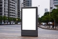 Mockup. White blank advertising billboard, vertical street digital lightbox poster panel, advertising banner board stand Royalty Free Stock Photo