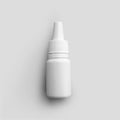 Mockup white matte bottle with dropper for medicine, liquid for treatment of nose, eyes, ears, plastic vial for design Royalty Free Stock Photo