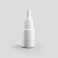 Mockup of white plastic jar with dropper for drops for nose, eyes, ears, vial isolated on background Royalty Free Stock Photo