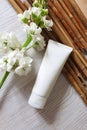 Mockup of white squeeze bottle plastic tube for branding of medicine or cosmetics - cream, gel, skincare. Cosmetic bottle Royalty Free Stock Photo