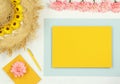 Mockup yellow frame with summer straw hat and notes Royalty Free Stock Photo