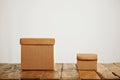 Mockups of blank brown corrugated cardboard boxes Royalty Free Stock Photo