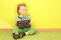 Mod little boy with a clapboard in