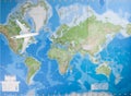 Model airplane flying over world map Royalty Free Stock Photo
