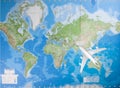 Model airplane flying over world map Royalty Free Stock Photo