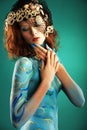 Model in Aqua bodypainting