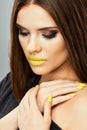Model Beauty Yellow Lips. Isolated close up face