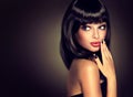 Model brunette with hairstyle of the care. Royalty Free Stock Photo
