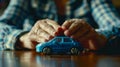 A Model Car Secured by Hands. AI generated Royalty Free Stock Photo