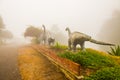 Model of Chiang Muang dinosaur with mist at Phayao province