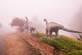 Model of Chiang Muang dinosaur with mist at Phayao province