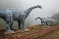 Model of Chiang Muang dinosaur with mist at Phayao province