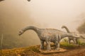 Model of Chiang Muang dinosaur with mist at Phayao province