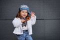 Model child hip-hop.baby in a baseball cap. Royalty Free Stock Photo