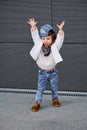 Model child hip-hop.baby in a baseball cap. Royalty Free Stock Photo