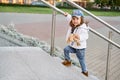 Model child hip-hop.girl child street fashion jeans clothes