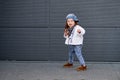 Model child hip-hop.baby in a baseball cap. Royalty Free Stock Photo