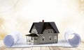 Classic house model on blueprint on white Royalty Free Stock Photo