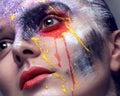 model with colorful artistic makeup