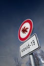 Model of corona virus as symbol for the new covid-19 mutant virus from south africa on a german traffic sign