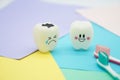 Model Cute toys teeth in dentistry on colorful pastel paper for background Royalty Free Stock Photo