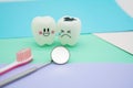 Model Cute toys teeth in dentistry on colorful pastel paper for background Royalty Free Stock Photo