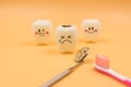 Model Cute toys teeth in dentistry on a yellow background Royalty Free Stock Photo