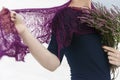 Model demonstrates knitted crochet scarf