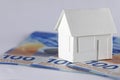 Detached house model, European Union currency Royalty Free Stock Photo