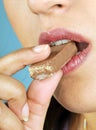 Model eating chocolate Royalty Free Stock Photo