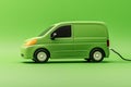 Model Electric Van Charging With Power Cable Against Green Studio Background