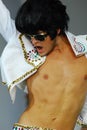 Model in 'Elvis Presley' style on fashion parade Royalty Free Stock Photo