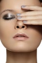 Model with fashion shiny make-up & nails manicure Royalty Free Stock Photo