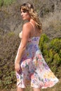 Model in floral dress from behind