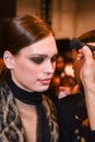 A model getting ready backstage at the Nicole Miller fashion show during MBFW Fall 2015 Royalty Free Stock Photo