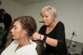 A model getting ready backstage before the Reem Acra Bridal show Fall/Winter 2018 Collection Royalty Free Stock Photo