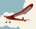 Model glider flying over sky with clouds in vintage color stylization Royalty Free Stock Photo