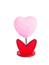 Model of a heart-shaped pink flowers memorial.