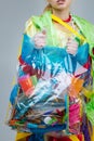 Model holding bag with plastic and fish realizing ocean pollution Royalty Free Stock Photo