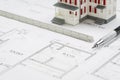 Model Home, Engineer Pencil and Ruler Resting On House Plans Royalty Free Stock Photo