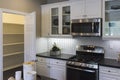 Model home kitchen and pantry. Royalty Free Stock Photo