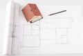 Model house on architecture construction plan Royalty Free Stock Photo