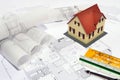Model house on a construction plan Royalty Free Stock Photo