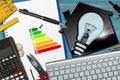Energy Efficiency Rating - House with Light Bulb Royalty Free Stock Photo