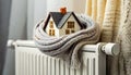 Model House Wrapped in a Warm Woolen Scarf on Radiator - Generative Ai