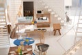 Model of kitchen in simple apartment, paper and cardboard layout. Furniture and decors, ideas of interior design