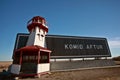 Model lighthouse and sign