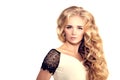 Model with long hair Blonde Waves Curls Hairstyle Hair Salon Updo Fashion model with shiny hair Woman with healthy hair girl with Royalty Free Stock Photo